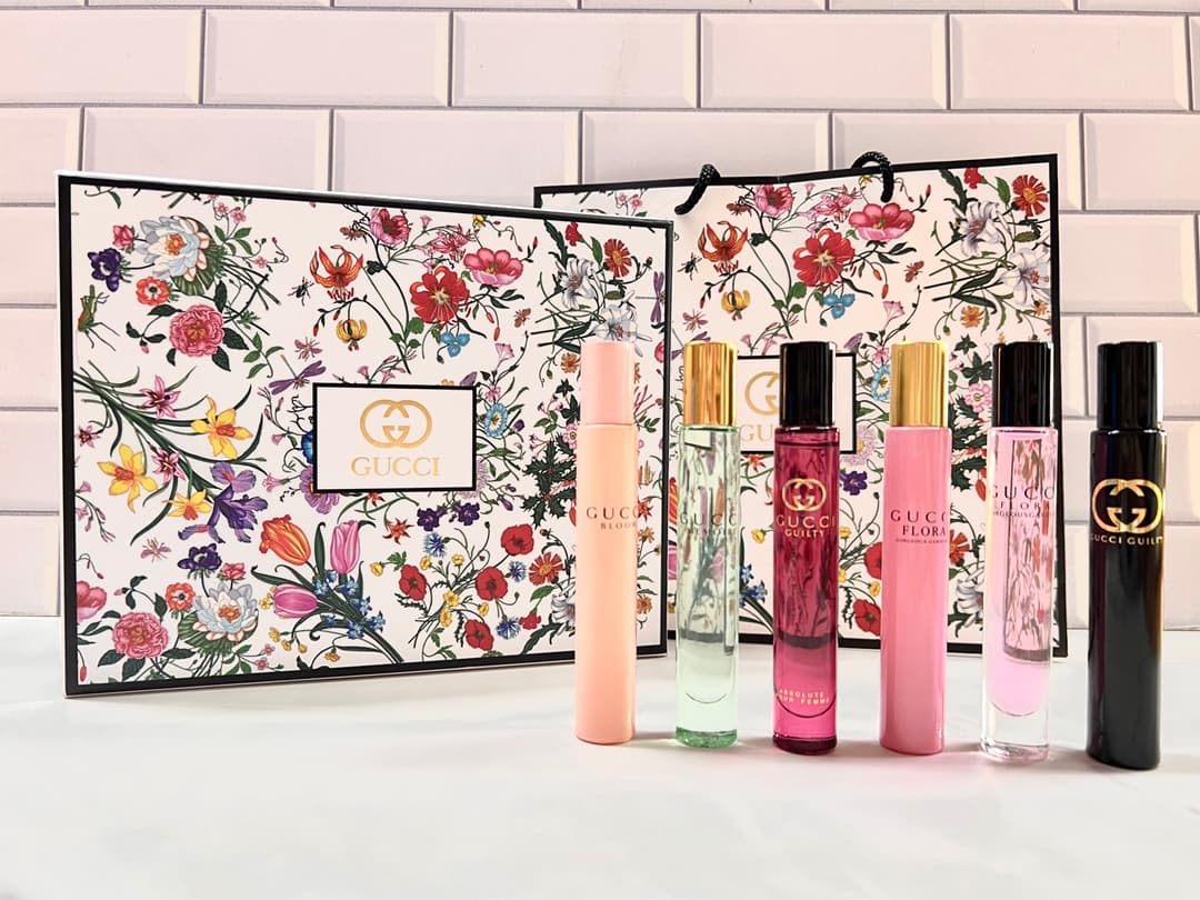 Gucci Roll-On Ball 6-Piece Set (7.4ml) with Gift Bag includes: Pink Floral, Green Memory, Red Guilty Love, Pink Dream, Gardenia, and Black Guilty Love